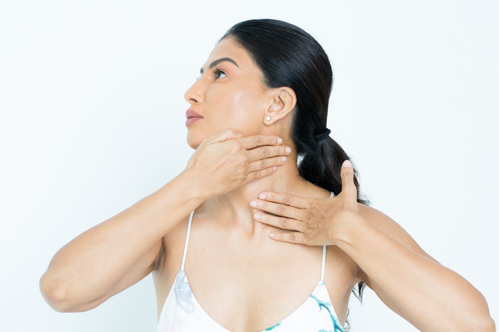 Uma connecting her face and neck practice