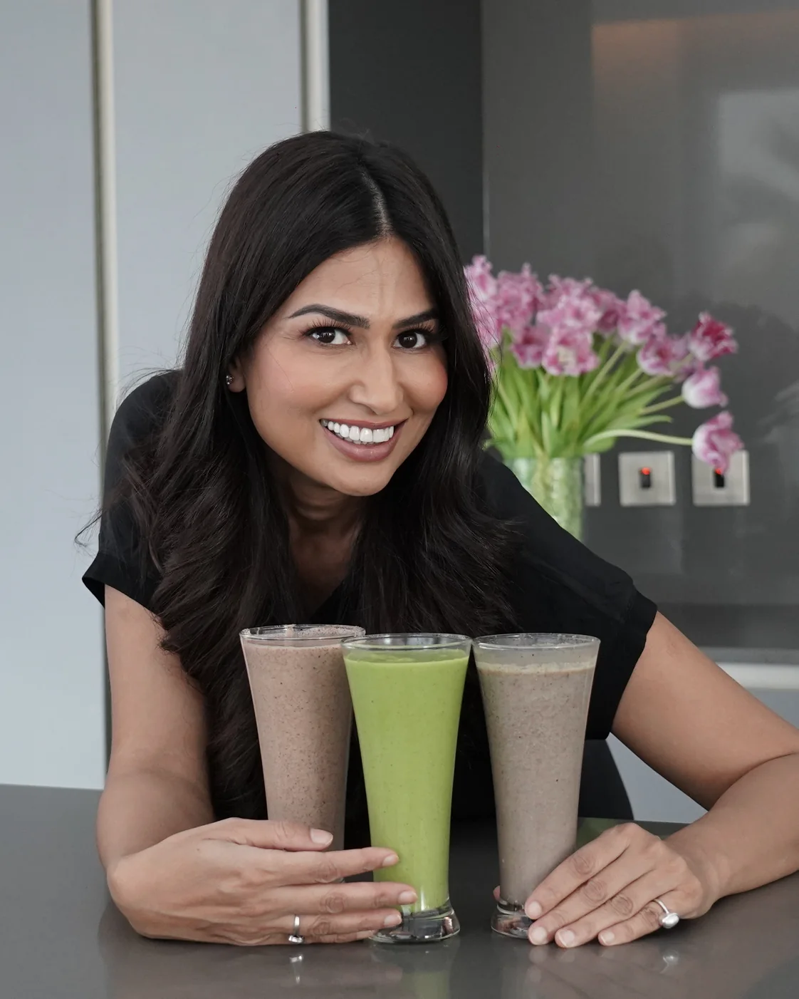 Uma Ghosh with fresh smoothies in her kitchen