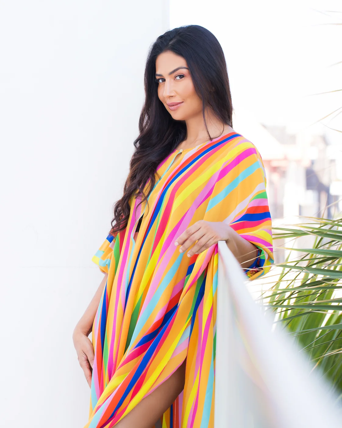 Uma Ghosh in a bright striped kaftan