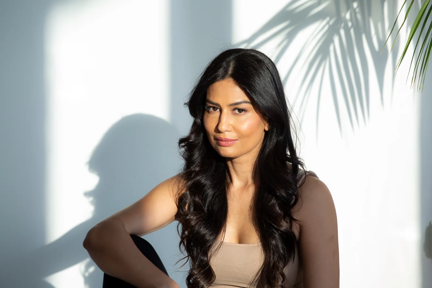Uma seated in warm natural light